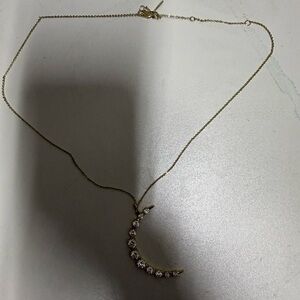 Elegant Gold Crescent Moon Necklace by Melinda Maria